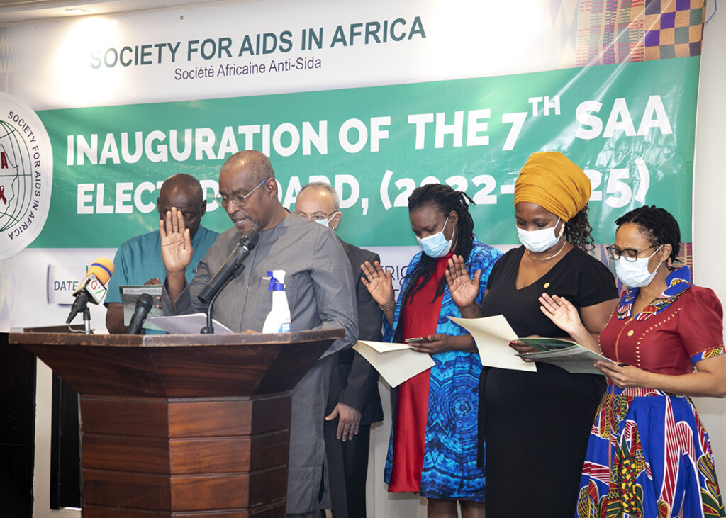 The newly elected Secretary General, Dr. Aliou Sylla leads the pledge in French after the President.