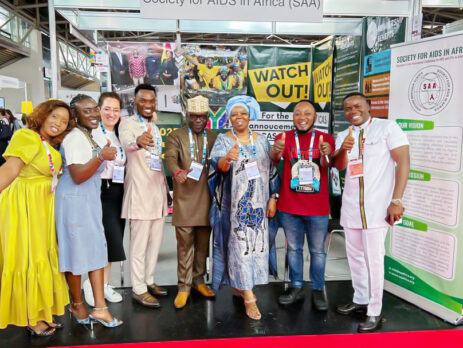 Mr. Luc Armand H. Bodea, ICASA Director/SAA Coordinator, Prof. Sheila Tlou, Board of Trustee; Madam Clemence A. Assogba, Head of Finance/ Admin;Chris K. Nuatro, Partnership/Marketing Officer in a group photograph with some delegates at the SAA booth no. 209, AIDS 2024 Conference.