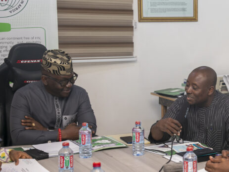 Dr. Kharmacelle Prosper Akanbong, Acting Director General of the Ghana AIDS Commission in a hearty conversation with Mr. Luc Armand Bodea, ICASA Director/SAA Coordinator